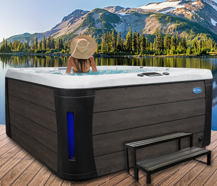Calspas hot tub being used in a family setting - hot tubs spas for sale 